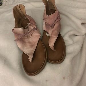 Pink slightly tye-died slip on with zipper in back. Size 7
